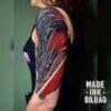 tatuaje cover dragón brazo