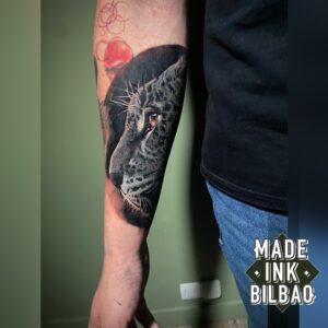 tatuaje cover leopardo antebrazo