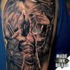 tatuaje león y espartano