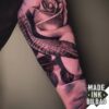 tatuaje biceps rosa serpiente