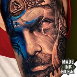 tatuaje manga vikinga odin y barco