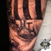 tatuaje manga vikinga odin y barco