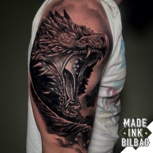 tatuaje cover brazo dragón