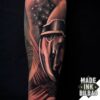 tatuaje antebrazo astronauta espacio