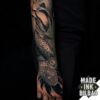 tatuaje antebrazo serpiente plantas