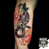 tatuaje cover serpiente rosas