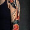tatuaje brazo garza rosas