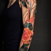 tatuaje brazo garza rosas
